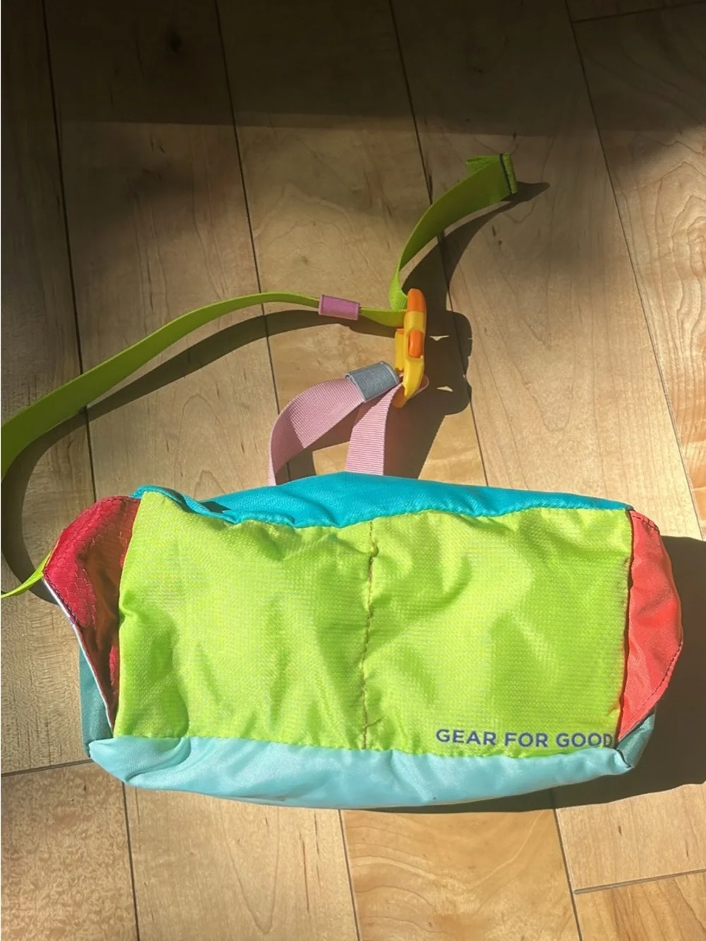 cotopaxi turquoise crossbody waist pack with pink zipper and lime strap - Picture 4 of 4